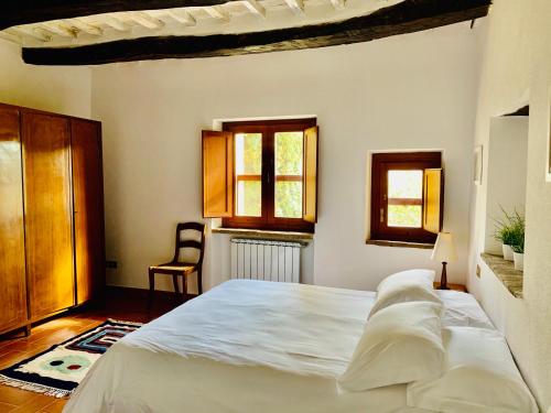 Postel nebo postele na pokoji v ubytování B&B VALLE D'ORO