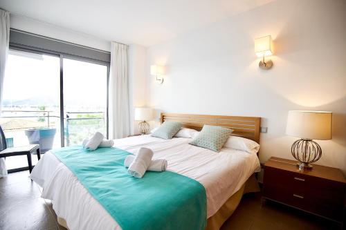 Postel nebo postele na pokoji v ubytování Apartamento Portobello