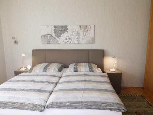 Postel nebo postele na pokoji v ubytování Premium-Ferienwohnungen Bergblick im Haus Hopfe