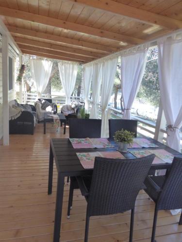 A restaurant or other place to eat at Adriatic Blue Coast Mobile Home