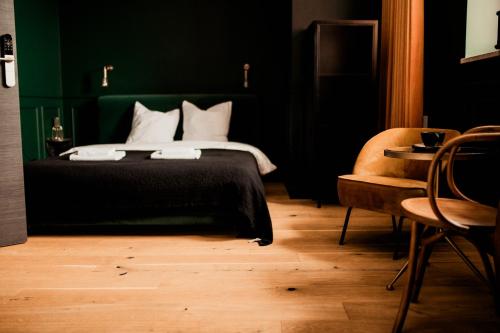 Postel nebo postele na pokoji v ubytování Boutique Hotel RABBIT HOLE