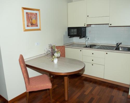 Η κουζίνα ή μικρή κουζίνα στο Residence Bertolini
