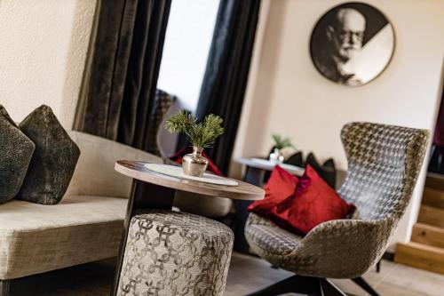 Posezení v ubytování Grand Hotel Wolkenstein