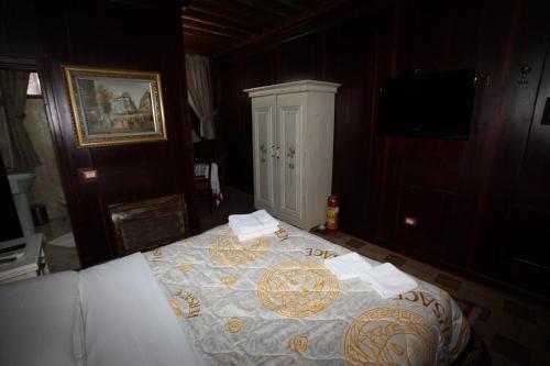 Postel nebo postele na pokoji v ubytování Hotel Iliada
