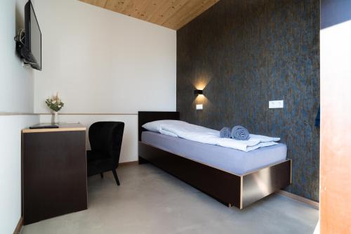 Postel nebo postele na pokoji v ubytování Motel Q
