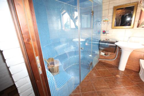Koupelna v ubytování Hotel Iliada