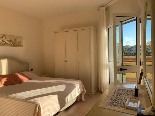 En eller flere senge i et værelse på Lilla apartment