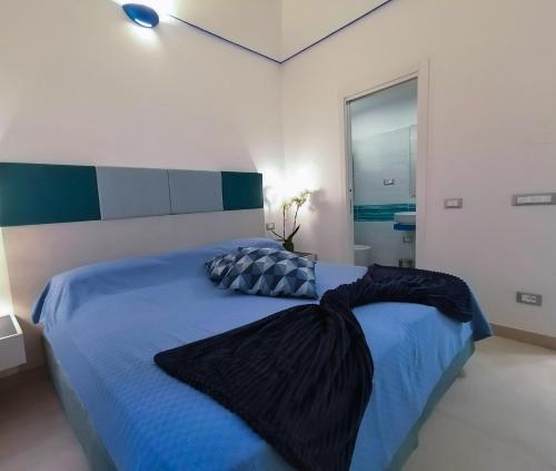 Atrani Roomsにあるベッド