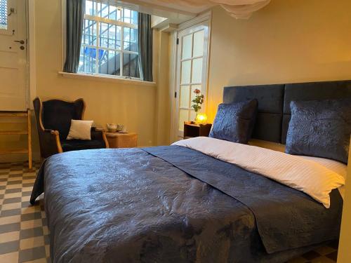 Postel nebo postele na pokoji v ubytování Prinsengracht Museum Bed and Breakfast