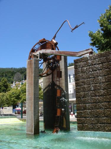 a water slide in a fountain in a water park at Miradouro da Serra in Monchique