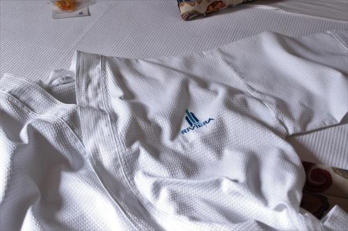 Cama o camas de una habitación en Hotel Riviera