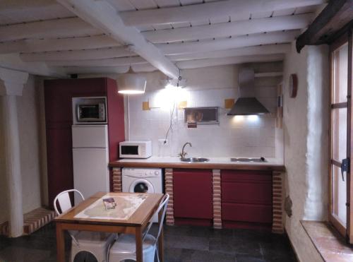 Virtuvė arba virtuvėlė apgyvendinimo įstaigoje La Herrera ll