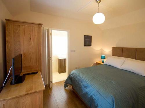 Katil atau katil-katil dalam bilik di Beechwood Cottage