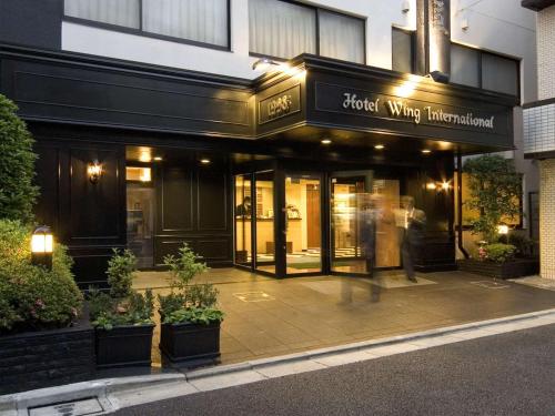 Фасад или вход в Hotel Wing International Korakuen
