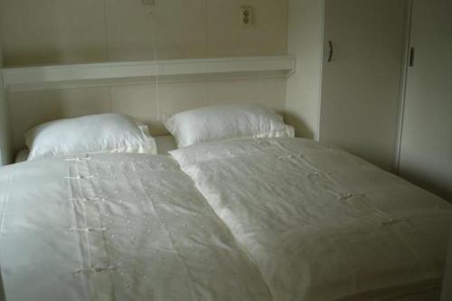 Ein Bett oder Betten in einem Zimmer der Unterkunft Chalet Mi Casita