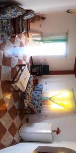a room with a counter and a tile floor at Adam and Eve House in Luxor