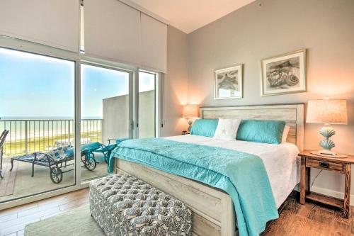 a bedroom with a bed and a balcony at Beachfront Condo with Pool in Galveston! in Galveston