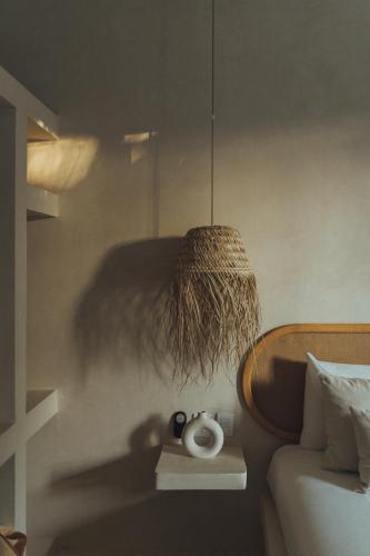 Ένα ή περισσότερα κρεβάτια σε δωμάτιο στο Casa Peregrino Holbox
