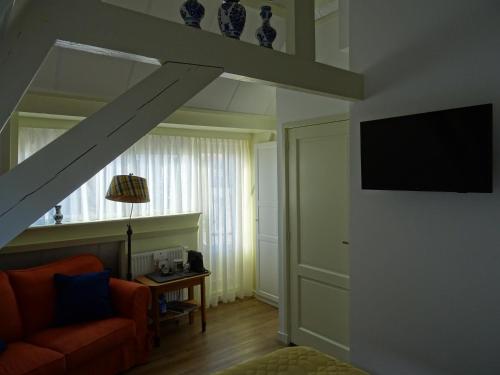 TV a/nebo společenská místnost v ubytování Emma's B&B