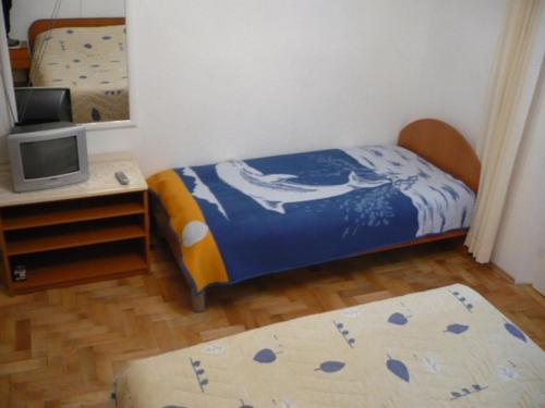 Postel nebo postele na pokoji v ubytování Apartment Eta - great location