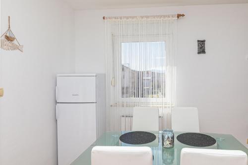 Kuchyň nebo kuchyňský kout v ubytování Apartments Jelena