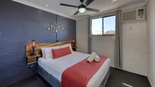 Ένα ή περισσότερα κρεβάτια σε δωμάτιο στο Grafton Lodge Motel