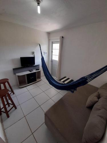 TV a/nebo společenská místnost v ubytování Ap08-A 50 Metros da Praia Flats Mobiliados para 4 Pessoas