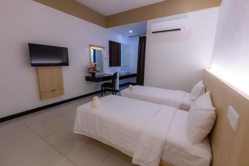 Μια τηλεόραση ή/και κέντρο ψυχαγωγίας στο Scott Service Suites