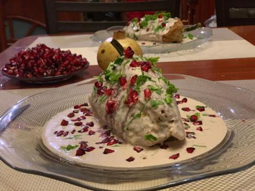 a ice cream dessert on a plate on a table at Quinta Maria Bonita Hotel Boutique in Xalapa