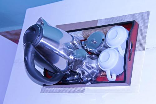 a box with a bunch of utensils in it at Bethel Resort & Hotels in Gulu