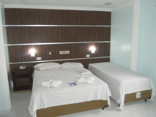 Postel nebo postele na pokoji v ubytování Casablanca Hotel Osasco