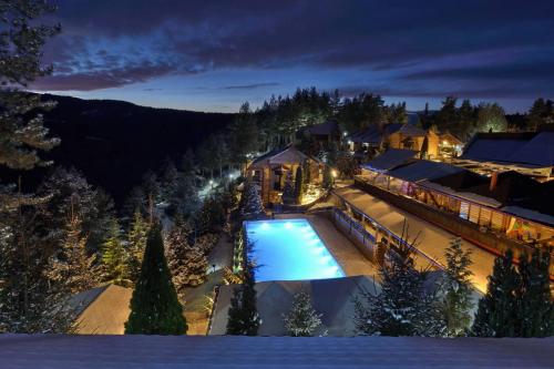 an aerial view of a resort with a swimming pool at Aurora Resort & Spa in Berovo