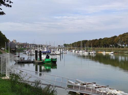 a group of boats docked in a harbor at Gite de la Baie des anges in Saint-Valery-sur-Somme
