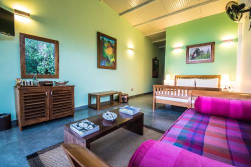 Postel nebo postele na pokoji v ubytování Ella Planters Bungalow
