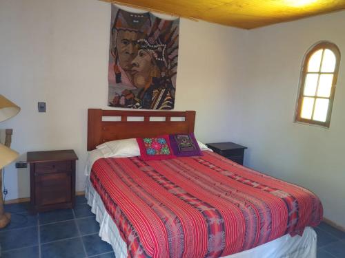 Postel nebo postele na pokoji v ubytování Hostal Candelaria