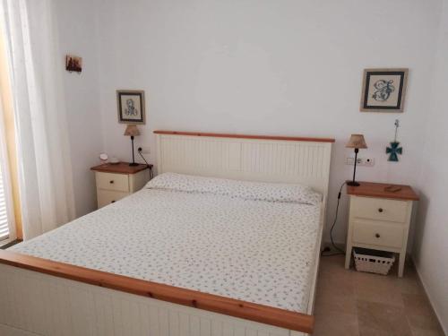 Ένα ή περισσότερα κρεβάτια σε δωμάτιο στο Apartamento Ailem