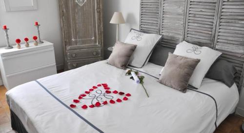 Säng eller sängar i ett rum på Mas au Cœur de La Provence & SPA