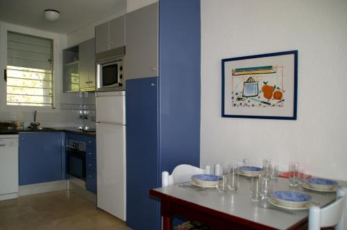 Dapur atau dapur kecil di Apartamentos Centremar