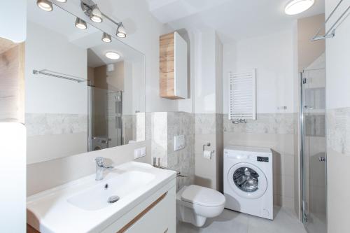 Koupelna v ubytování Resort Apartamenty Klifowa Rewal 41