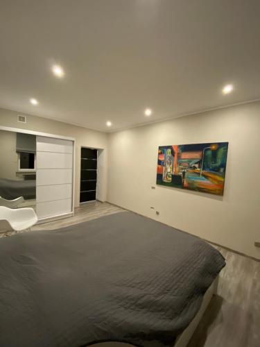 Ένα ή περισσότερα κρεβάτια σε δωμάτιο στο Apartament Centrum- Art&Design
