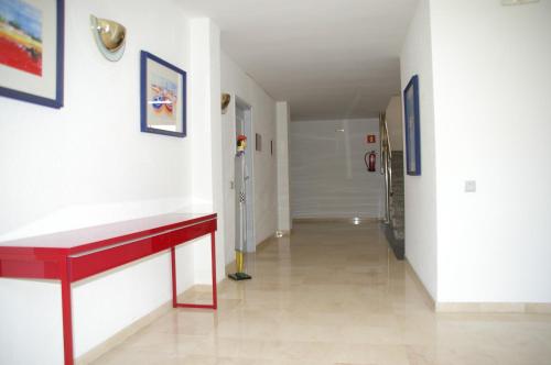 Televisyen dan/atau pusat hiburan di Apartamentos Centremar
