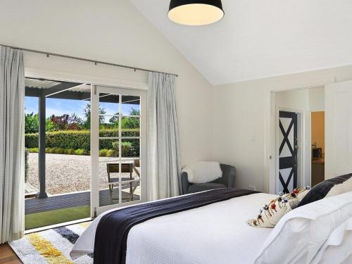 Ένα ή περισσότερα κρεβάτια σε δωμάτιο στο Duncraig House
