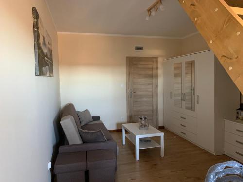 Χώρος καθιστικού στο Domki i apartamenty "Nadmorska 27A"