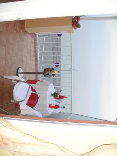 a window with a view of a room at HOSTAL COSTA SOL in Castell de Ferro