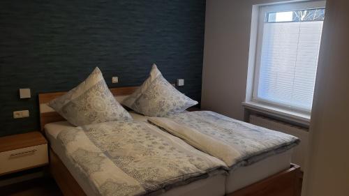 Katil atau katil-katil dalam bilik di Ferienwohnung Ortsmitte-Willingen