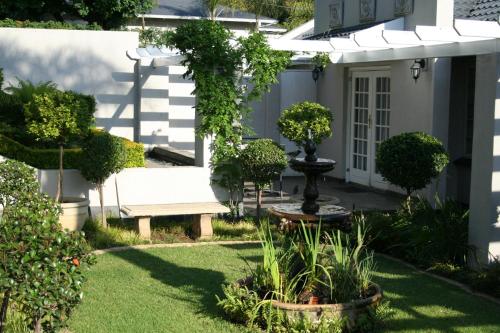 Jardin de l'établissement Touch of Class Guest House