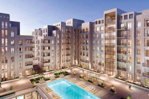 an rendering of an apartment complex with a pool at Blissful 1BR in Safi Town Square by Deluxe Holiday Homes in Dubai