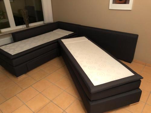 En eller flere senge i et værelse på Apartment 350 mit Brockenblick