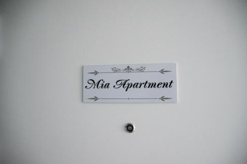a sign on a wall that reads alpha equipment at Mia Kiviõli Apartment in Kiviõli