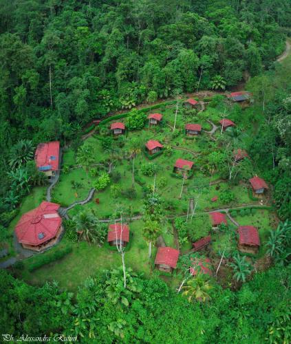 an aerial view of a village with red roofs at Pacuare River Lodge in Bajo Tigre